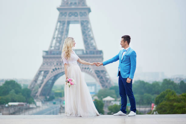 istock Just married couple near the Eiffel tower in Paris 639166074