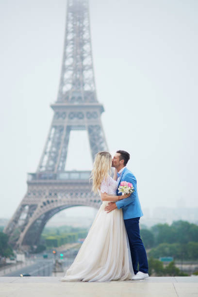 istock Just married couple near the Eiffel tower in Paris 639166104