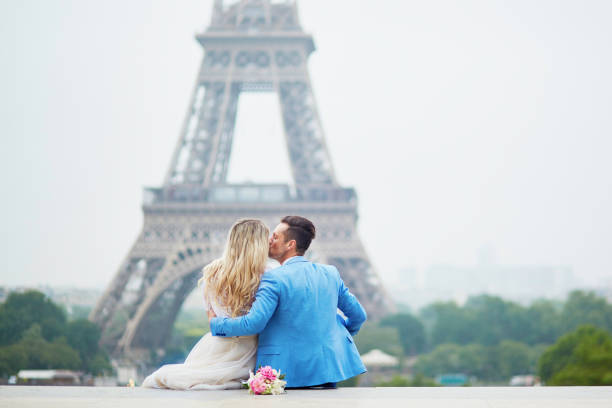 istock Just married couple near the Eiffel tower in Paris 639166128