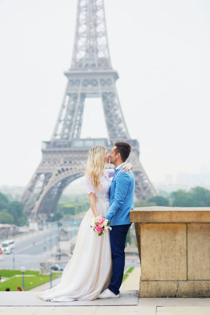 istock Just married couple near the Eiffel tower in Paris 639166238