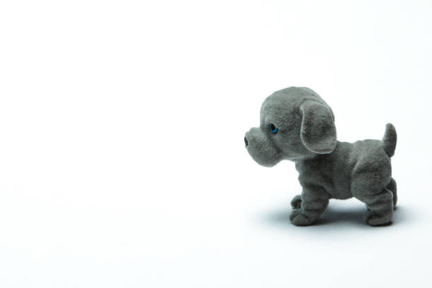 Toy of a dog on a light background