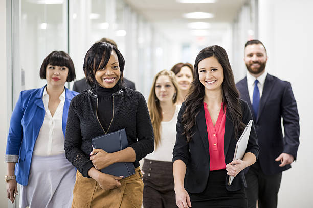 istock Attractive Young Business Team Walking 639171306