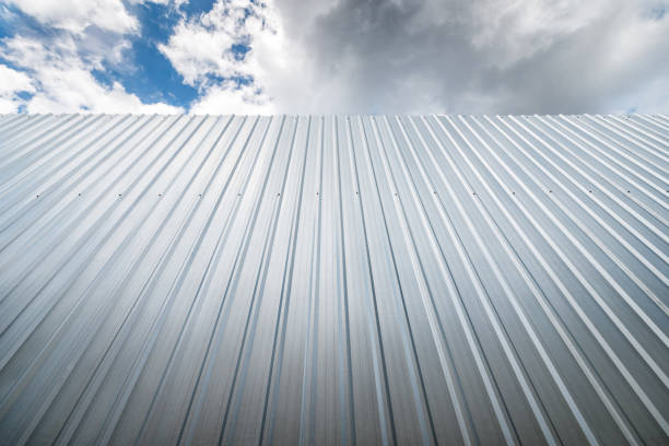 istock metal sheet wall against blue sky 639174014