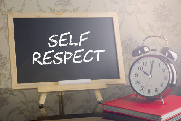 istock Self Respect on blackboard with flare and clock. 639174692
