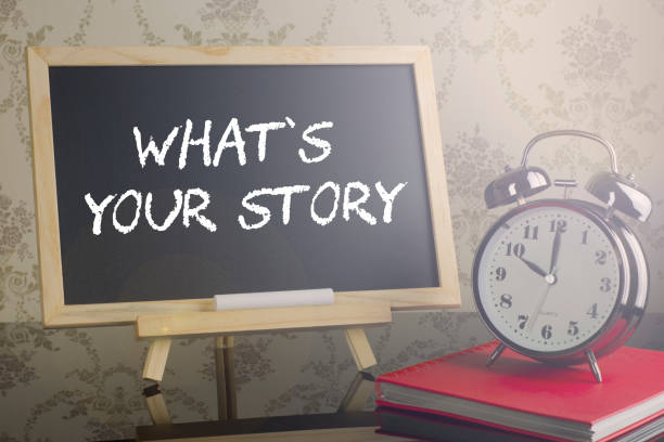 istock What your story on blackboard with flare and clock. 639174848