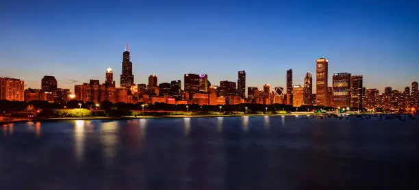 Photo of Chicago Skyline at Night over Lake Michigan