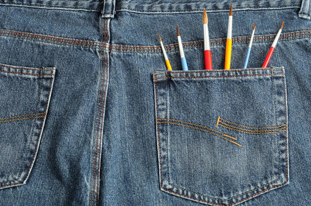 istock Paint brushes sticking out of a pocket 639180074