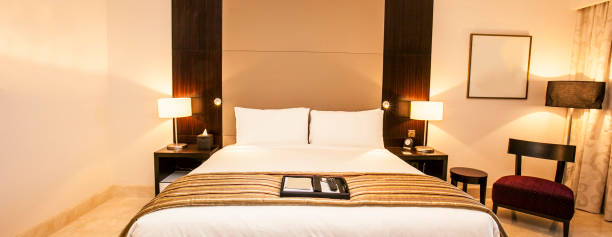 istock Bed in hotel room 639180850
