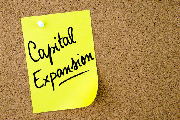 istock Capital Expansion text written on yellow paper note 639180992