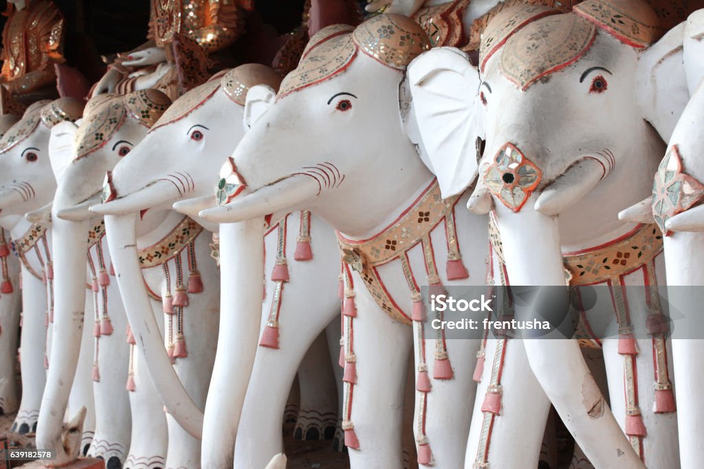 Old statues of elephants, Maha Bodhi Ta Htaung monastery, Myanma Rows of old stone statues of elephants, Maha Bodhi Ta Htaung monastery, famous Bodhi Tataung temple complex, Monywa, Sagaing Region, Myanmar (Burma) Ancient Stock Photo