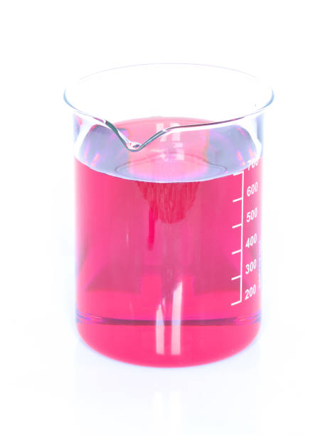 istock Chemical beaker with red chemicals dissolved in water 639186888