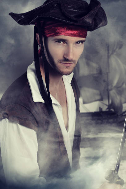 istock Young pirate holding a sword 639192442