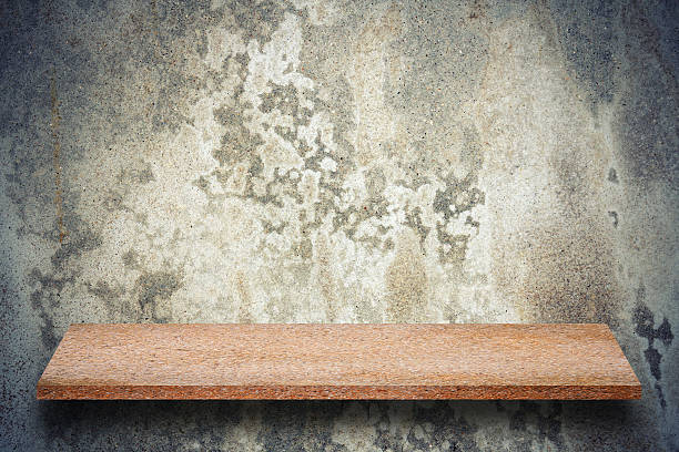 Empty top of natural stone shelves and stone wall