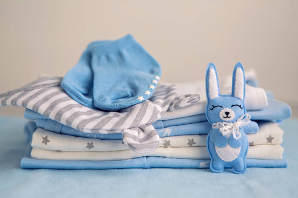 istock children's clothes with the diapers are stacked 639196362