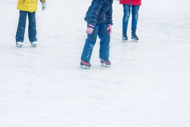 istock boy and two girls skate 639197070