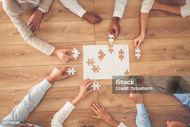 Business People Finding Solution Together At Office Stock Photo - Download Image Now