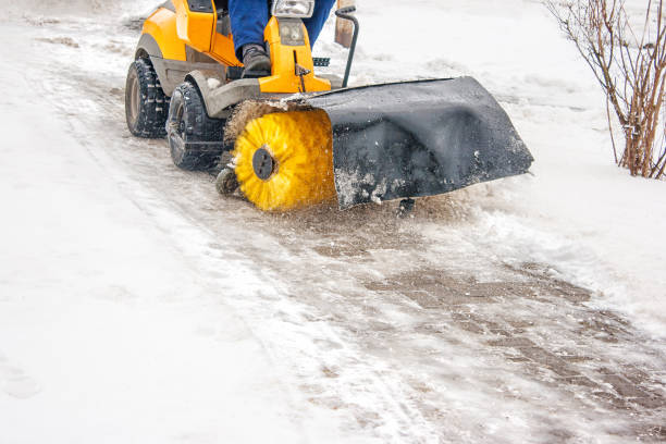 istock man cleans snow machines 639198450