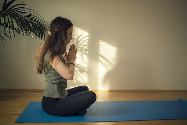 istock Women exercise meditation 639198602