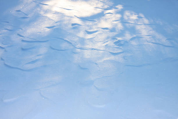 istock sunlight on the white snow background. 639201162