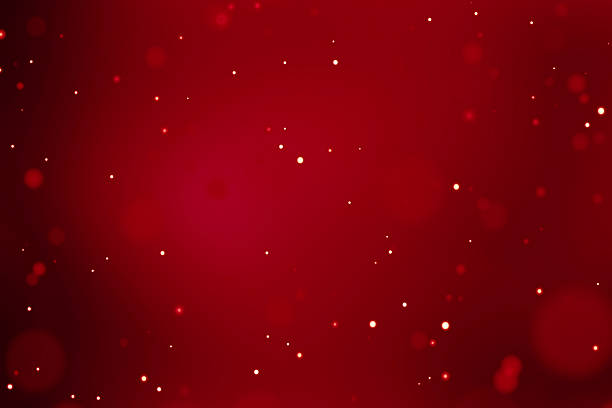 istock abstract christmas gradient red background with bokeh flowing 639201706