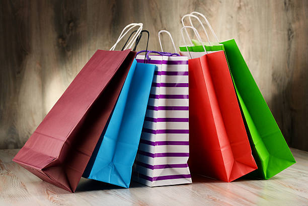 istock Composition with colorful paper shopping bags 639204972