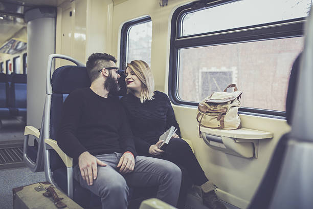 istock Couple traveling by train 639205376