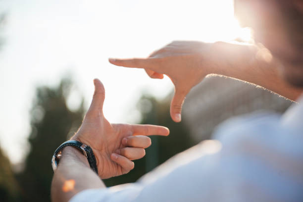 Photo Frame Hands Photo Frame Hands Made By A Young Man the bigger picture stock pictures, royalty-free photos & images