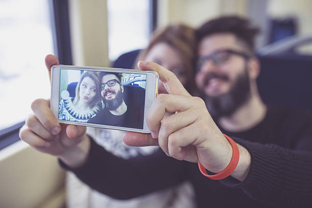 istock Happy couple traveling by train 639207312