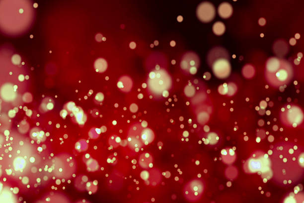istock abstract christmas gradient red background with bokeh flowing 639213086