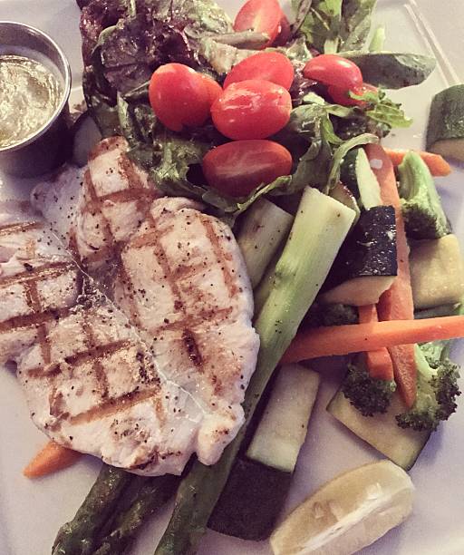 istock Healthy dinner: grilled wahoo fish with vegetables 639213612