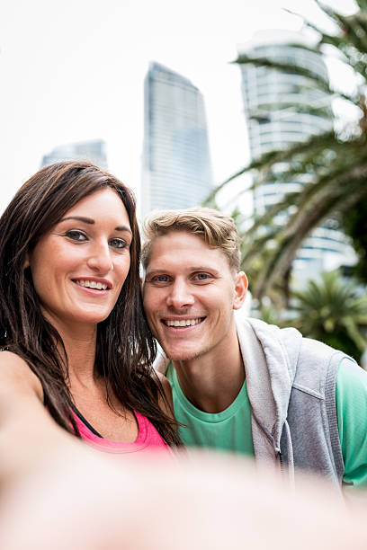 istock Young couple doing selfie with smart phone 639214524