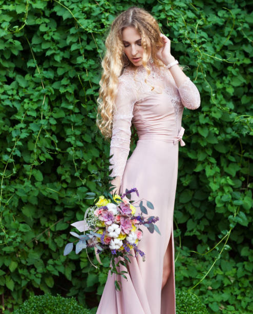 istock Bride holding the wedding bouquet with succulent flowers 639217738