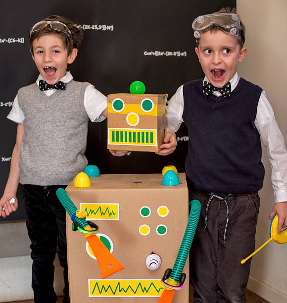 istock Children and Their Toy Robot 639225536