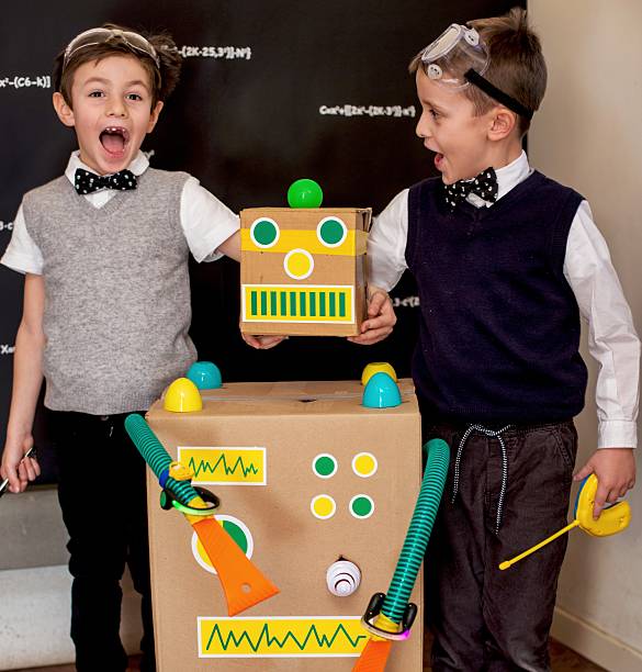 istock Children and Their Toy Robot 639225726
