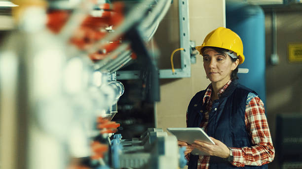 istock Technician working on valve in factory or utility 639226362