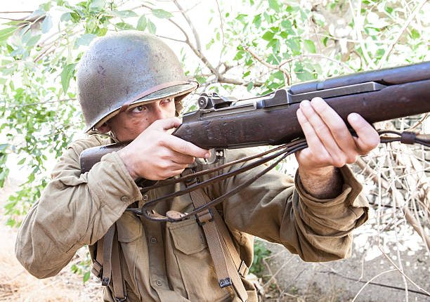 istock Soldier Aiming a Rifle WWII 639228636
