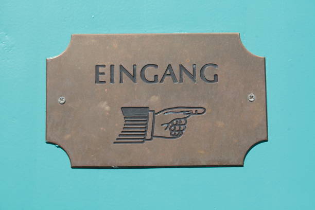istock Entrance sign with hand 639233456