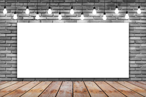 istock Blank white frame on brick wall with bulb lights lamp. 639234070