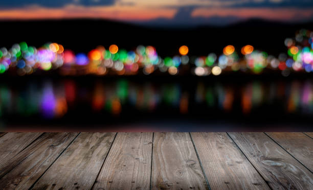 istock old wood table with bokeh  background 639234764