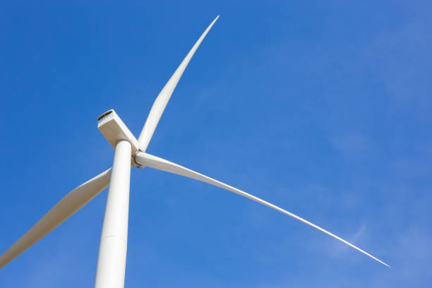 istock wind turbine on blue sky 639235034