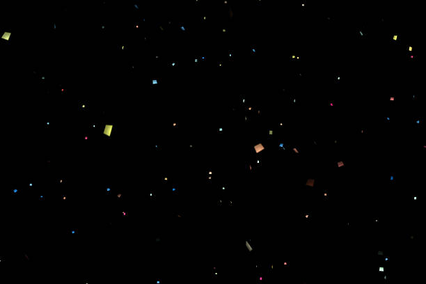 istock falling colorful glitter foil confetti, on black background 639237774