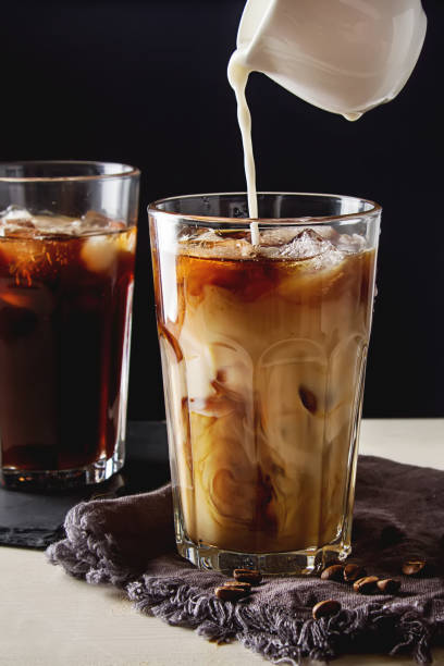 istock Iced coffee with milk. Summer drink. Dark background. 639239960