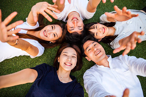 People having fun, taking a Selfie all together at party