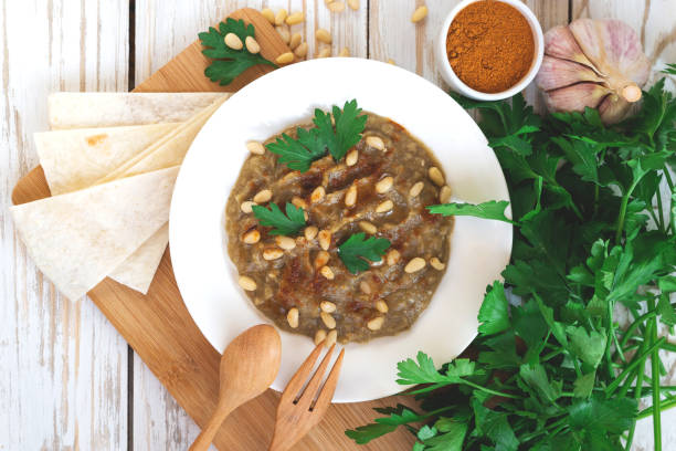 istock Baba ganoush - traditional arabian eggplant dip with flat bread 639243754