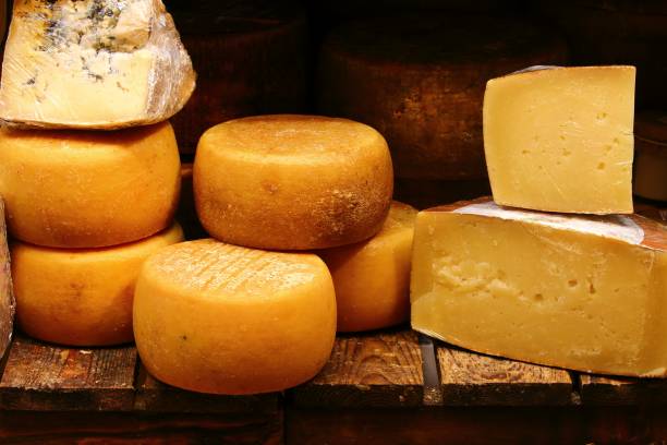 istock wheels of cheese 639244420