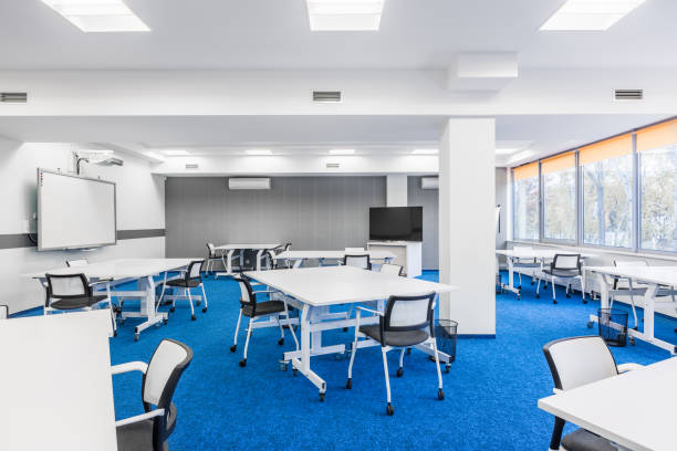 University group study room Modern university group study room with white desks and chairs projector screen classroom stock pictures, royalty-free photos & images