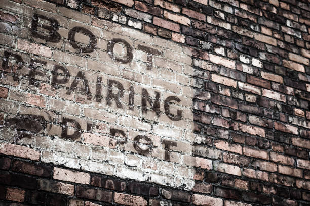 Vintage commercial sign on brick wall