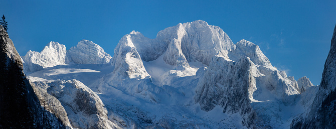 Tour du Montblanc beautiful mountain peaks and green valley. TMB trekking route scenic landscape in italian, swiss and french Alps in Chamonix valley alpine scene