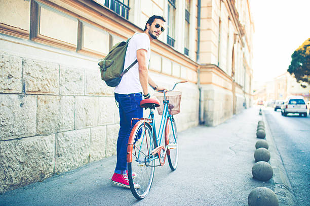 istock Young man rides vintage bicycle 639256902
