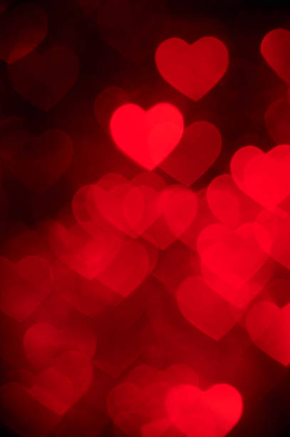 istock red heart bokeh background photo, abstract holiday backdrop 639257870